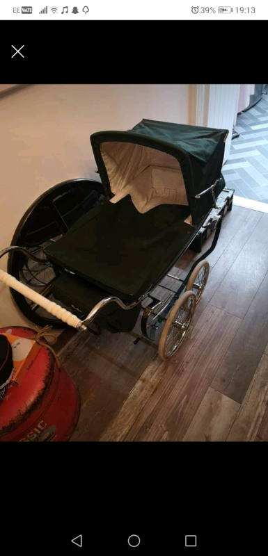 green silver cross dolls pram